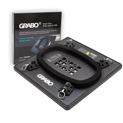 A black GRABO High-Flow Base Add-On 400 lifting accessory set, featuring a heavy-duty textured base plate with integrated handles and a large oval lifting pad, shown alongside its retail packaging box on a white background.