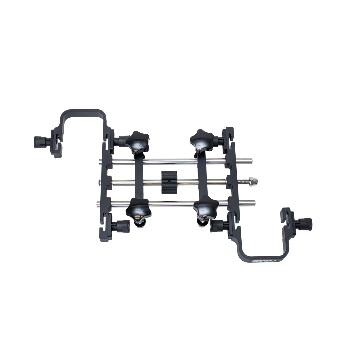 Set of black metal clamps on a white background
