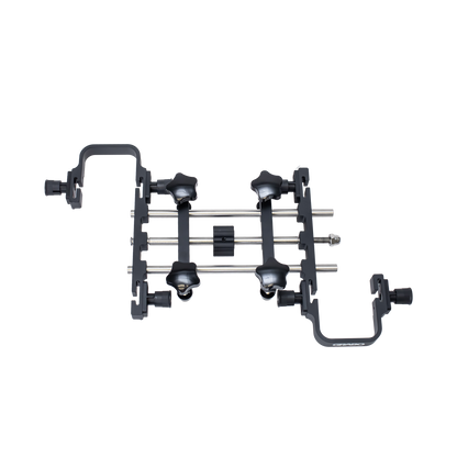 Set of black metal clamps on a white background